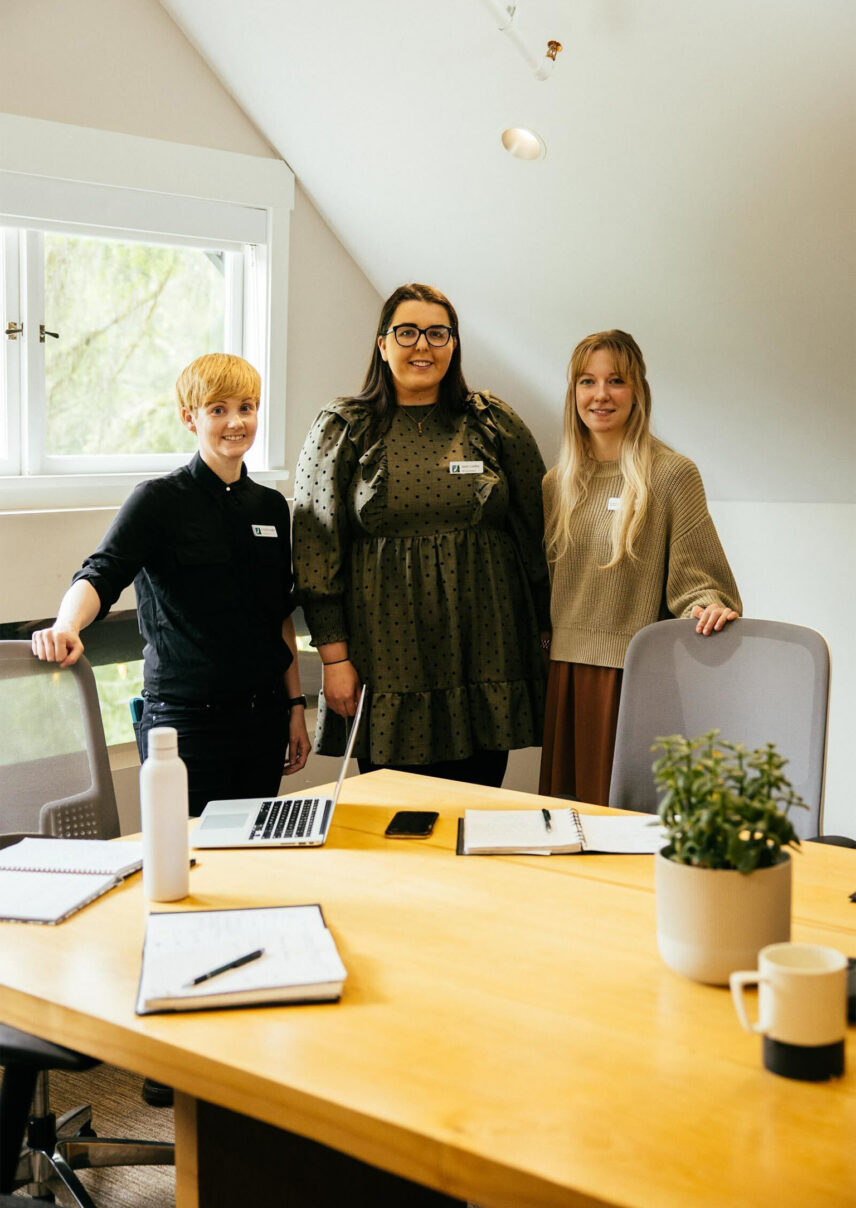 team members standing in the office at Capilano Suspension Bridge Park