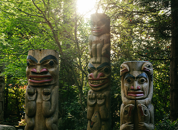 totem poles at kia'palano capilano suspension bridge park